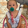Aspen joined the competition — help win amazing prizes! toddler, pacifier, child, blue_outfit, pink_chair, pony_tail, indoor, tile_floor, baby, cute, sitting, patterned_floor, clothing, person, furniture, floor, face, young_child, seat, infant
