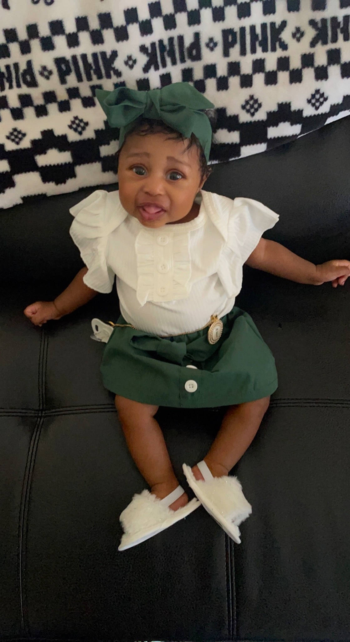 Marleigh is registered to the contest to win money with this photo: baby_toddler_clothing, child, computer_keyboard, event, fashion_accessory, formal_wear, fun, happy, human_body, human_leg, input_device, knee, pattern, person, sitting, sleeve, smile, sock, thigh, toddler