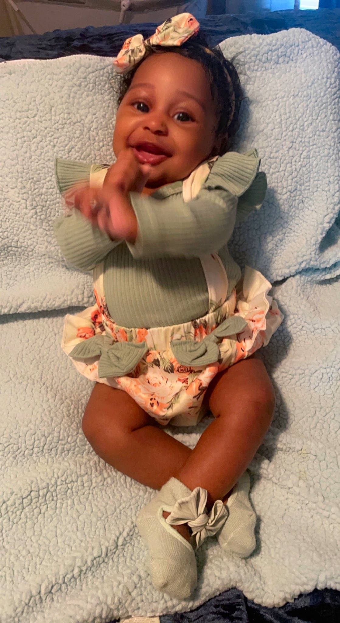 Marleigh is registered to the contest to win money with this photo: baby, baby_toddler_clothing, cheek, comfort, elbow, eye, face, finger, happy, head, human_body, human_leg, joint, joy, knee, leg, person, skin, sleeve, smile