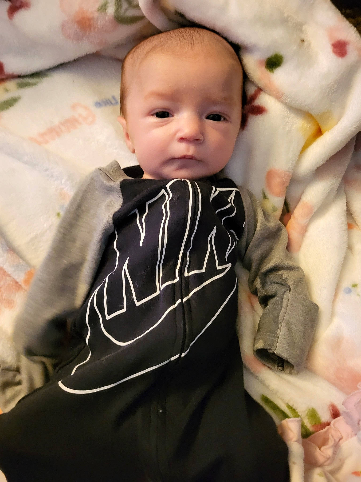 Lydia is registered to the contest to win money with this photo: baby, baby_toddler_clothing, cheek, child, chin, collar, comfort, eye, eyebrow, face, flash_photography, happy, linens, pattern, person, sitting, skin, sleeve, t_shirt, textile