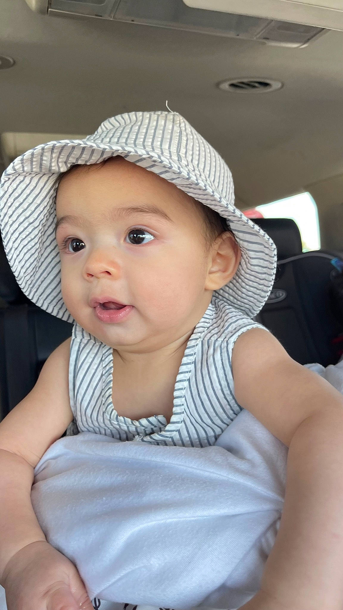 Jonah is registered to the contest to win money with this photo: baby, baby_products, baby_toddler_clothing, cap, cheek, child, chin, comfort, cool, fashion_accessory, fun, happy, hat, headwear, iris, lip, person, skin, sleeve, smile