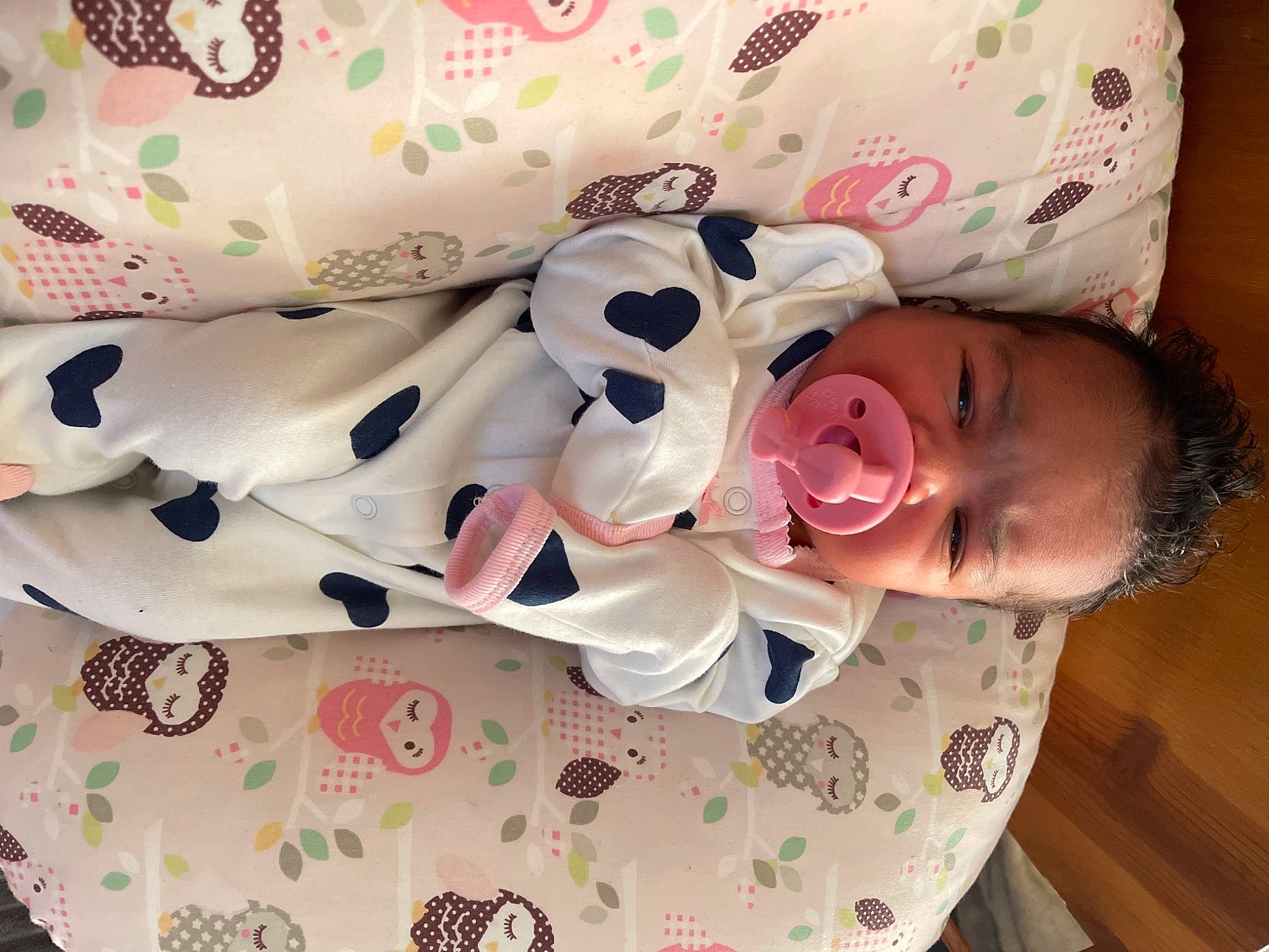 Karlie is registered to the contest to win money with this photo: baby, baby_products, baby_toddler_clothing, carmine, child, comfort, creative_arts, happy, linens, pattern, person, pink, room, smile, textile, toddler, white