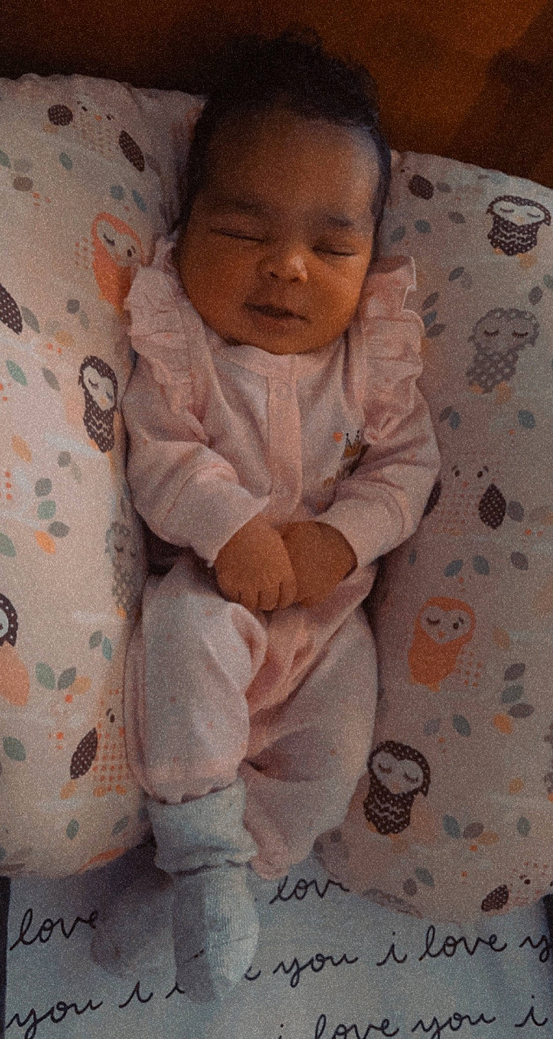 Karlie joined the competition — help win amazing prizes! baby, baby_safety, baby_sleeping, baby_toddler_clothing, bedding, cheek, comfort, eye, face, flooring, gesture, head, human_body, linens, nose, person, skin, sleeve, smile, textile