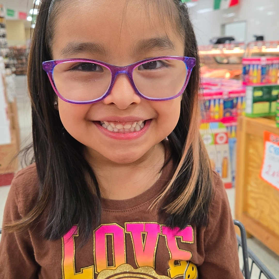 Kiana Amarie is registered to the contest to win money with this photo: accessories, animal, bodypart, child, clothing, coat, face, female, girl, glasses, happy, head, mouth, person, photography, portrait, smile, t_shirt, teeth, tiger