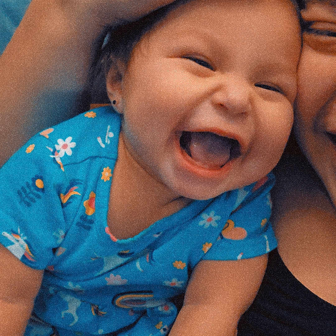 Amelia Ivory joined the competition — help win amazing prizes! accessories, baby, babylaughing, bodypart, bracelet, couch, earring, face, finger, furniture, hand, happy, head, jewelry, laughing, person, photography, portrait, ring, smile