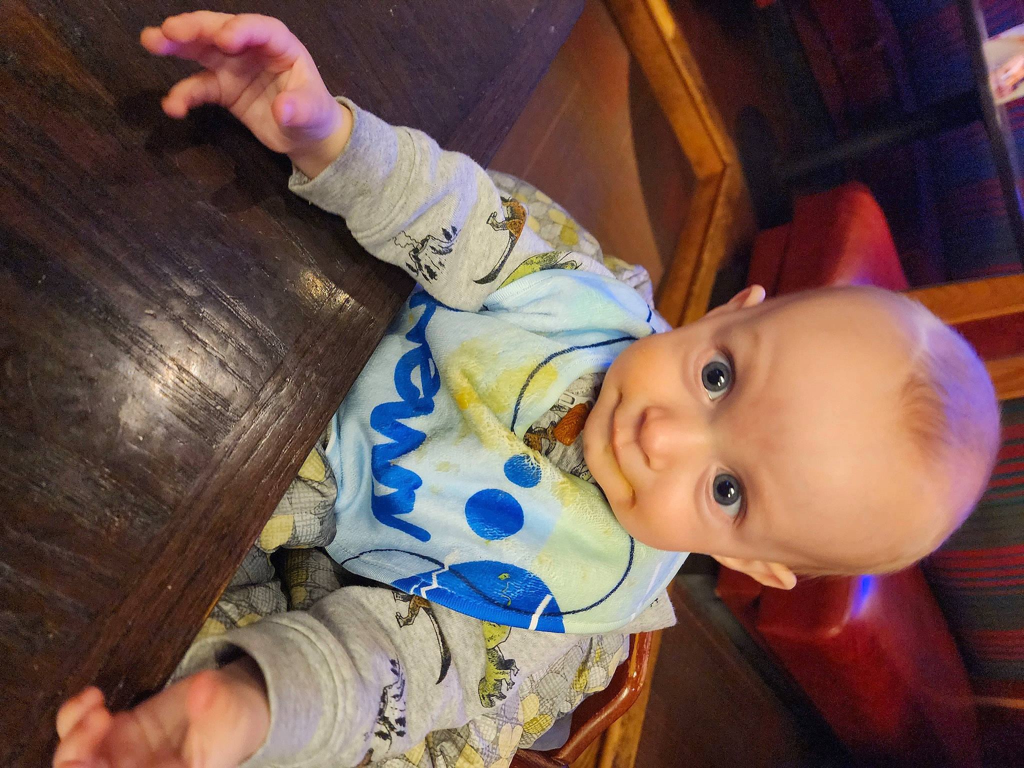 Jaxon is registered to the contest to win money with this photo: baby, baby_toddler_clothing, cheek, child, fun, happy, hardwood, iris, nose, person, room, sitting, skin, sleeve, toddler, wood