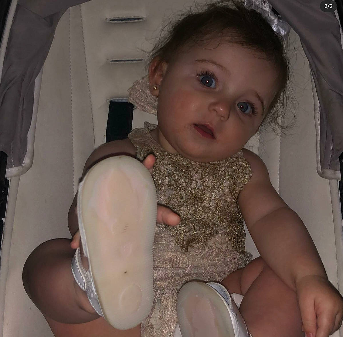 Bonnie is registered to the contest to win money with this photo: arm, baby_toddler_clothing, cheek, chin, comfort, eye, eyebrow, eyelash, face, gesture, hairstyle, head, iris, leg, lip, mouth, nose, organ, person, skin