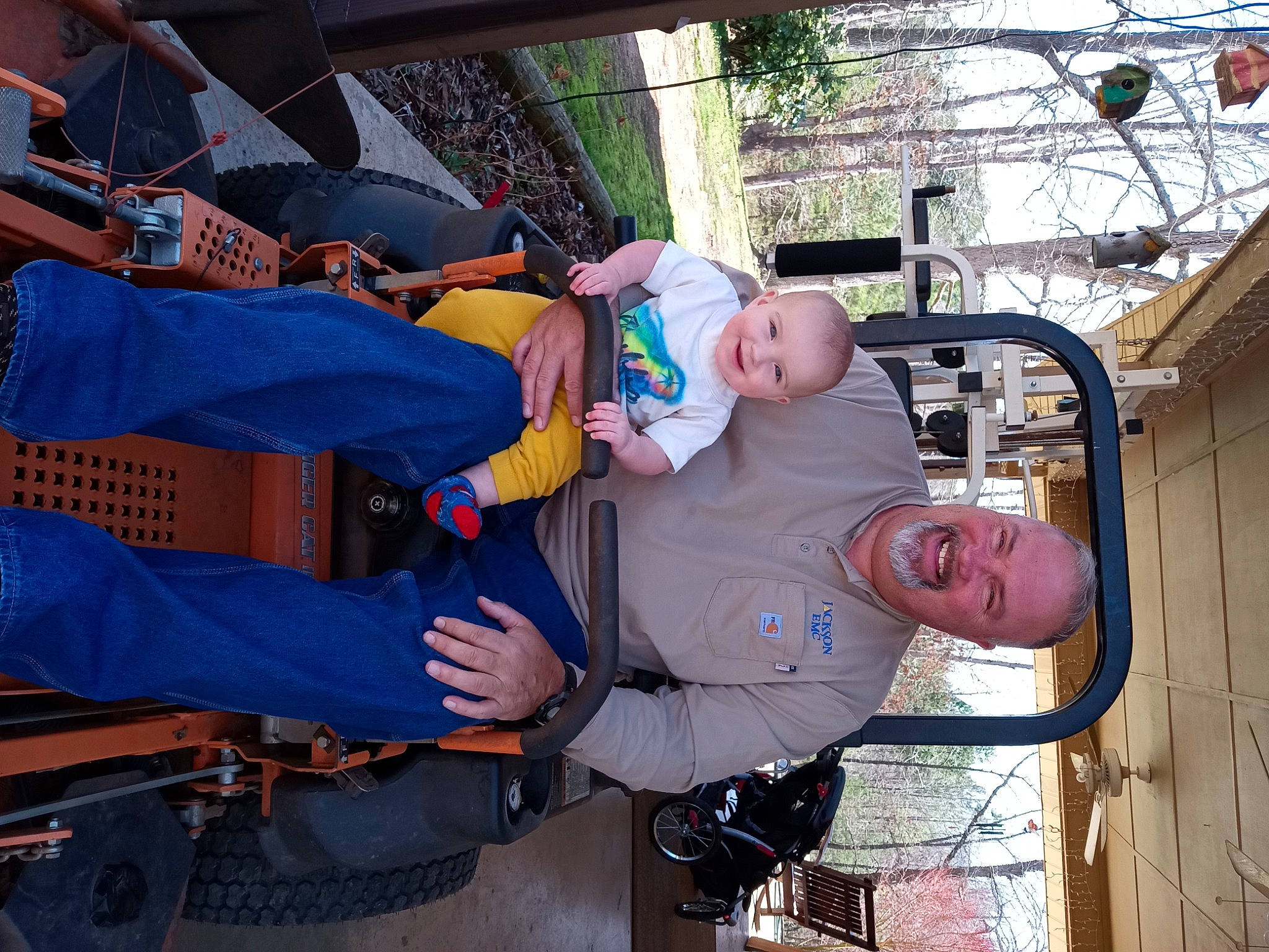 Colson is registered to the contest to win money with this photo: baby, child, electric_blue, engineering, fun, hat, joy, leisure, outdoor_shoe, person, smile, t_shirt, toddler, transport, travel, walking_shoe