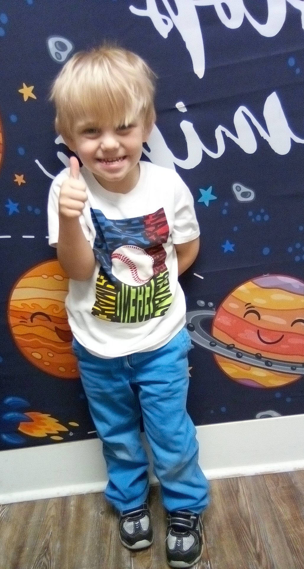 Bennett is registered to the contest to win money with this photo: ball, calabaza, child, cool, cucurbita, denim, electric_blue, font, fun, happy, joy, logo, orange, pattern, people, person, pumpkin, sleeve, smile, t_shirt