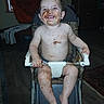 Tommus is registered to the contest to win money with this photo: baby, child, high_chair, smiling, messy, chocolate, food, face, portrait, indoors, seated, chair, barefoot, toddler, happy, playful, flash_photography, home, clothing, funny