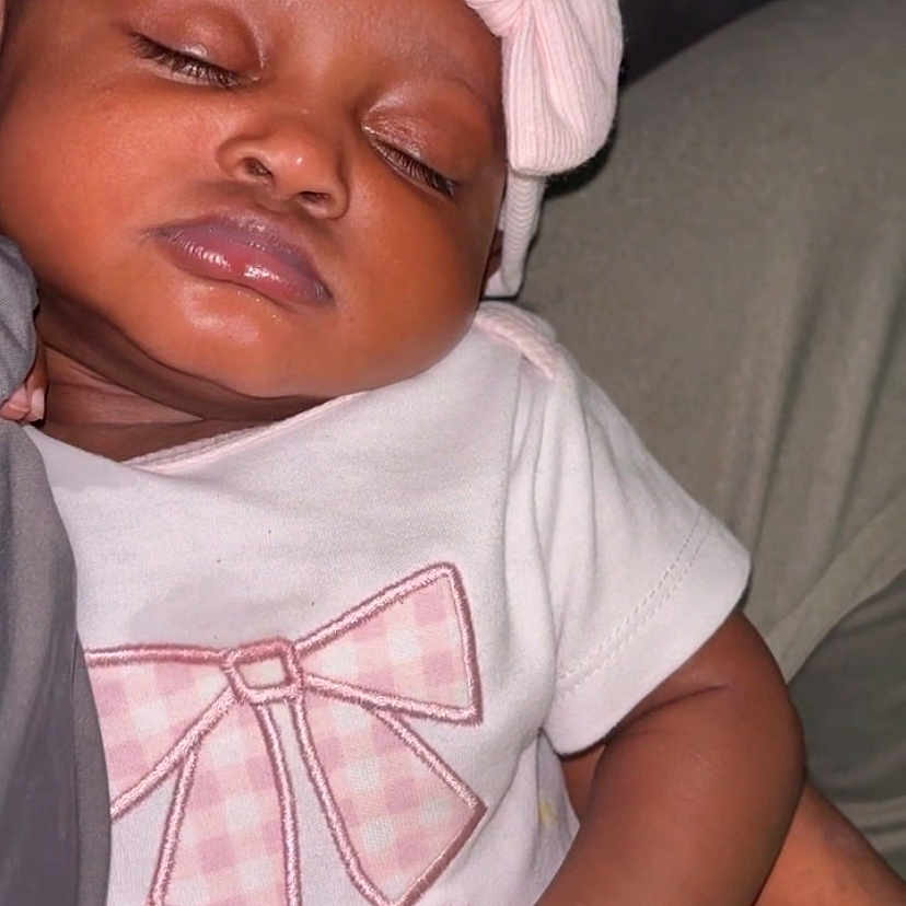 Evelynn joined the competition — help win amazing prizes! baby, babylaughing, bodypart, bonnet, cap, clothing, cushion, face, happy, hat, head, homedecor, neck, newborn, person, photography, portrait, sad, sleeping, smile