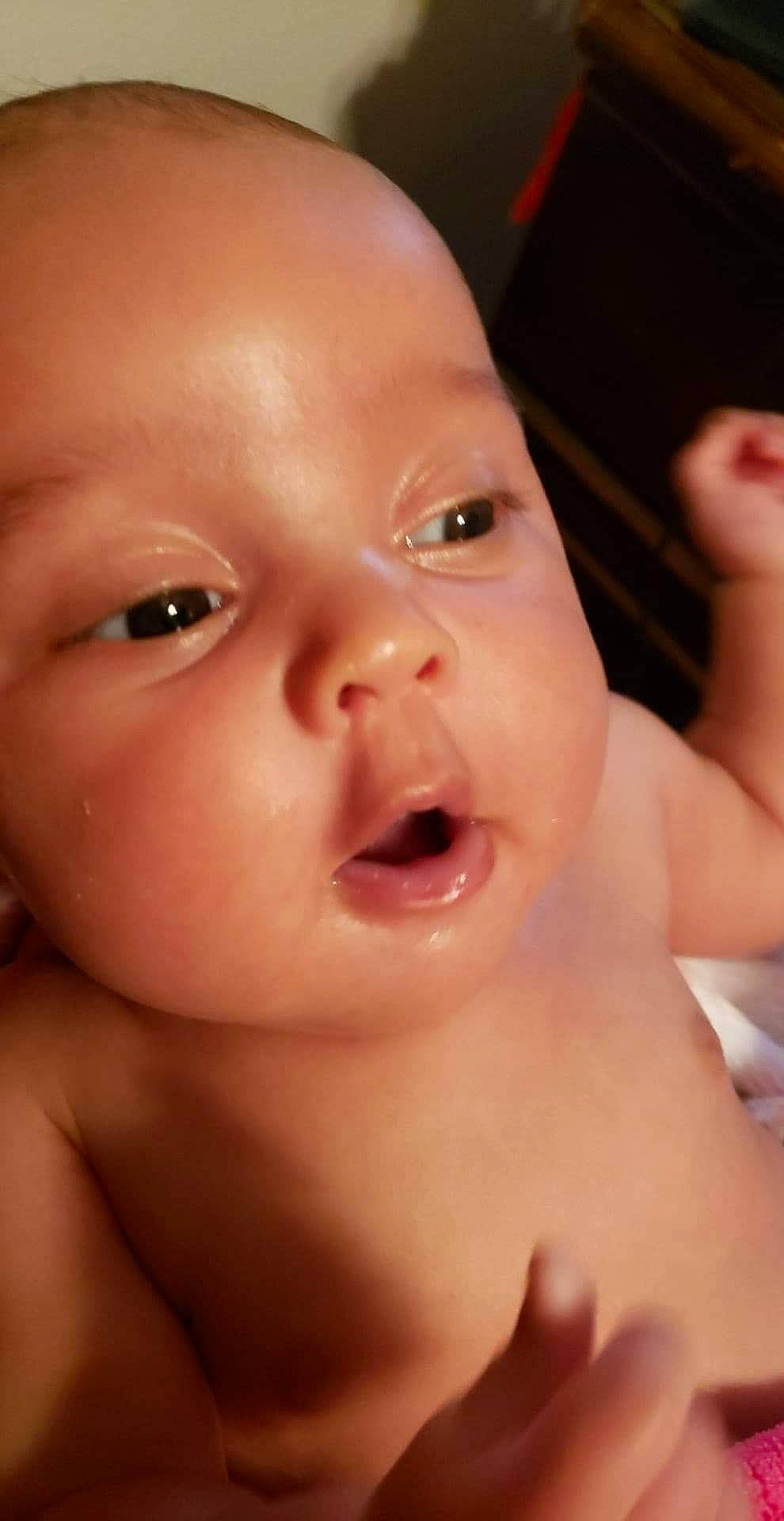 Nakya is registered to the contest to win money with this photo: baby, baby_making_funny_faces, cheek, child, chin, close_up, eye, eyebrow, face, facial_expression, finger, forehead, head, lip, mouth, muscle, nose, organ, person, skin