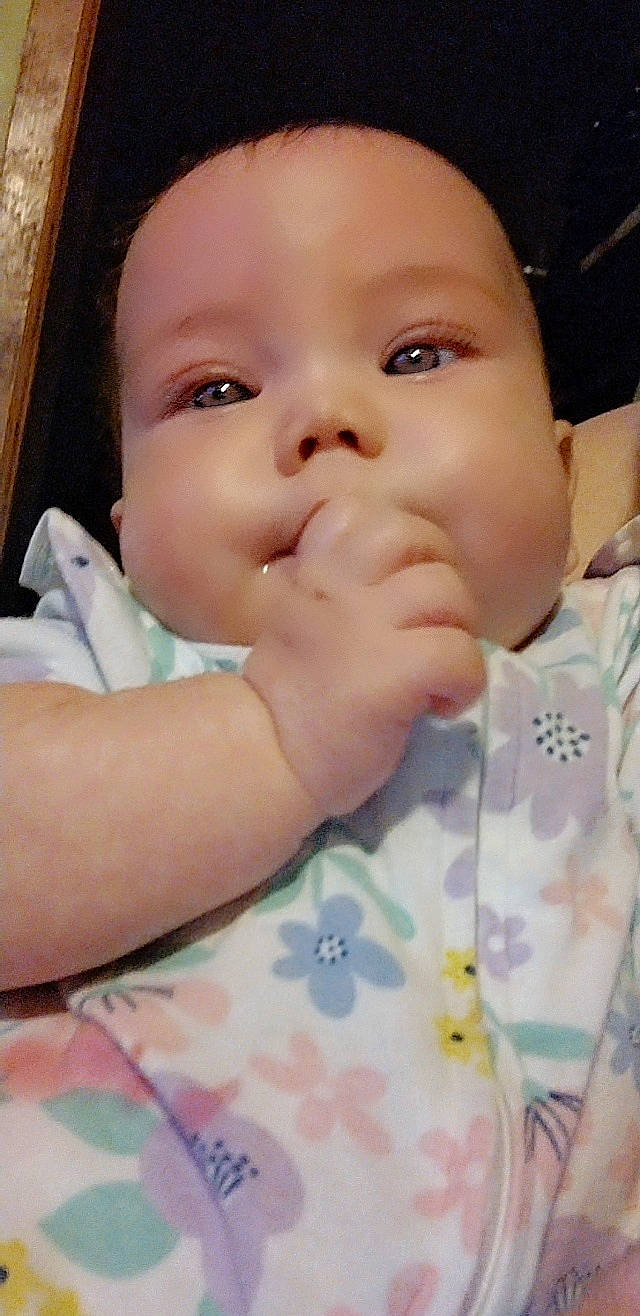 Kiarah is registered to the contest to win money with this photo: baby, baby_toddler_clothing, cheek, chin, eye, eyebrow, eyelash, finger, gesture, happy, head, headwear, iris, lip, mouth, nail, nose, person, skin, sleeve