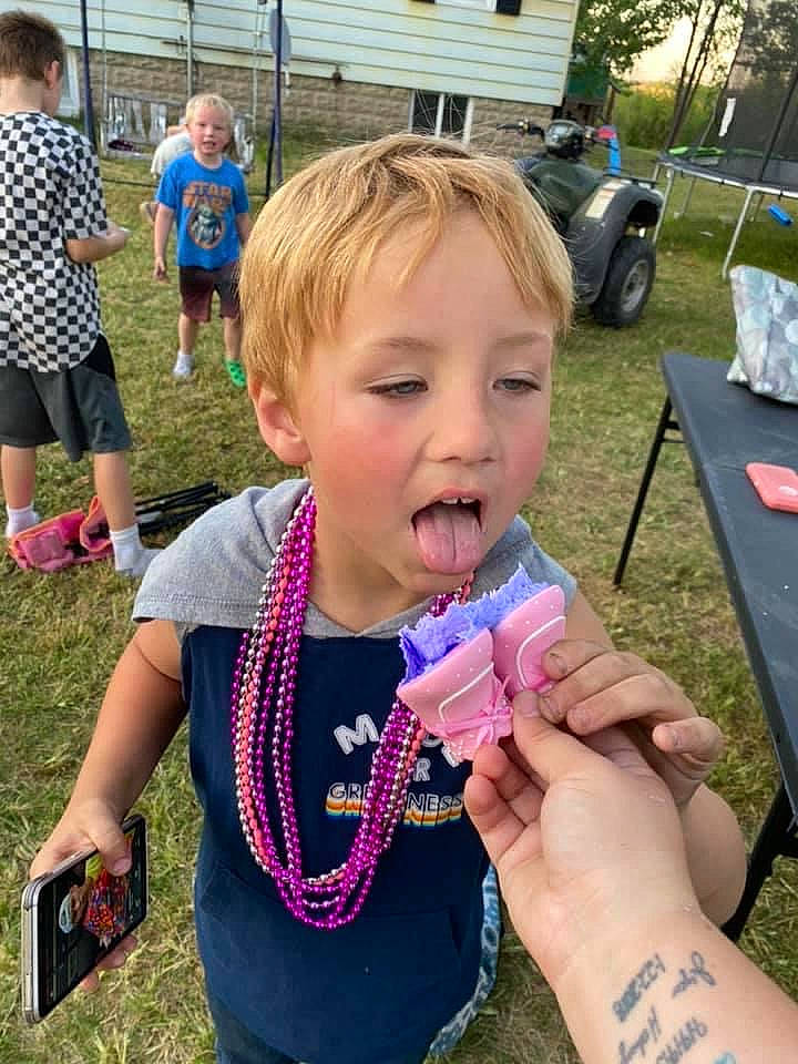 Kameron is registered to the contest to win money with this photo: chair, child, event, fun, grass, happy, ice_cream, leisure, nail, person, pink, play, public_space, recreation, shorts, spring, summer, t_shirt, thumb, toddler