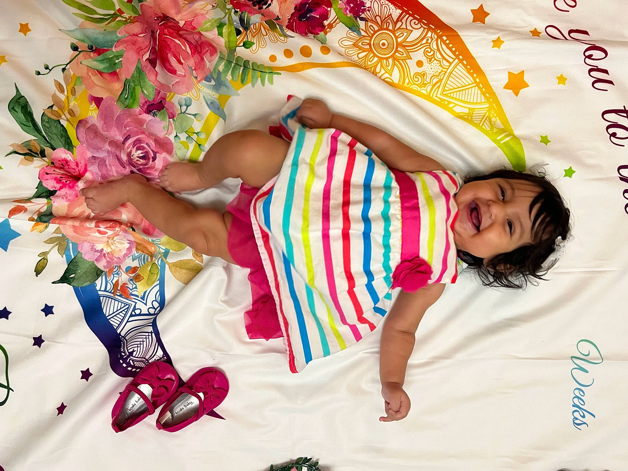 Emilia joined the competition — help win amazing prizes! arm, child, dress, fashion_accessory, flower, fun, happy, human_leg, linens, magenta, pattern, peach, person, petal, pink, room, sleeve, textile, thigh, visual_arts