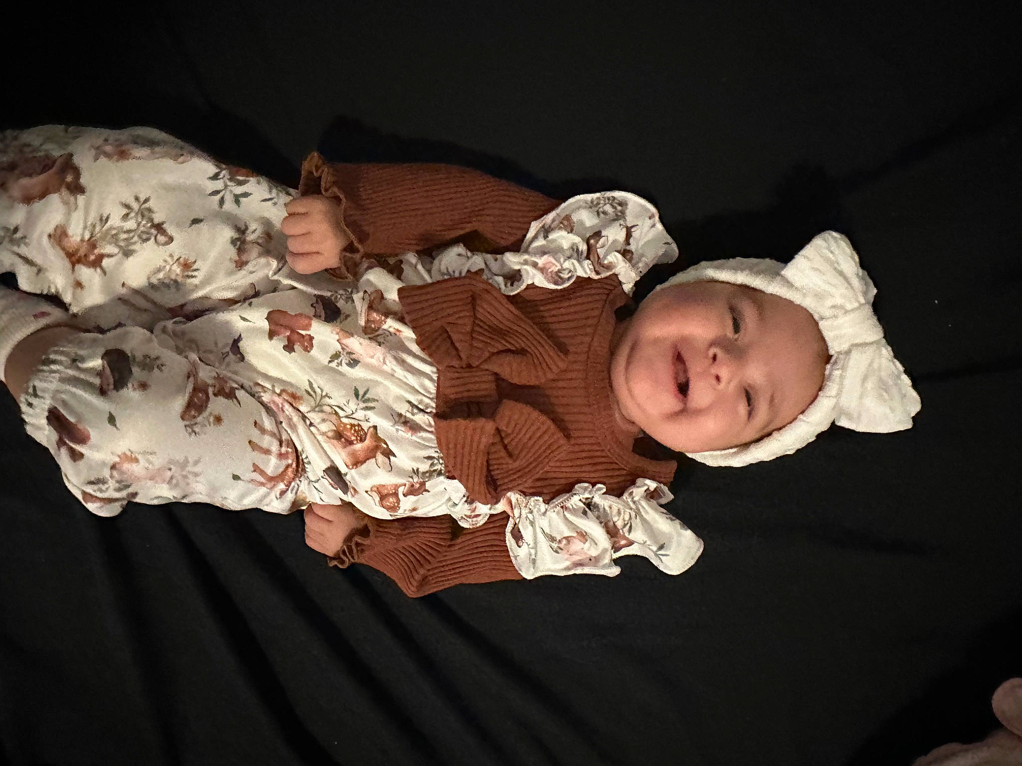 Ava Reign joined the competition — help win amazing prizes! baby, baby_products, baby_toddler_clothing, brown, cheek, child, comfort, darkness, flash_photography, happy, headwear, pattern, person, portrait_photography, sitting, skin, sleeve, toddler, wood