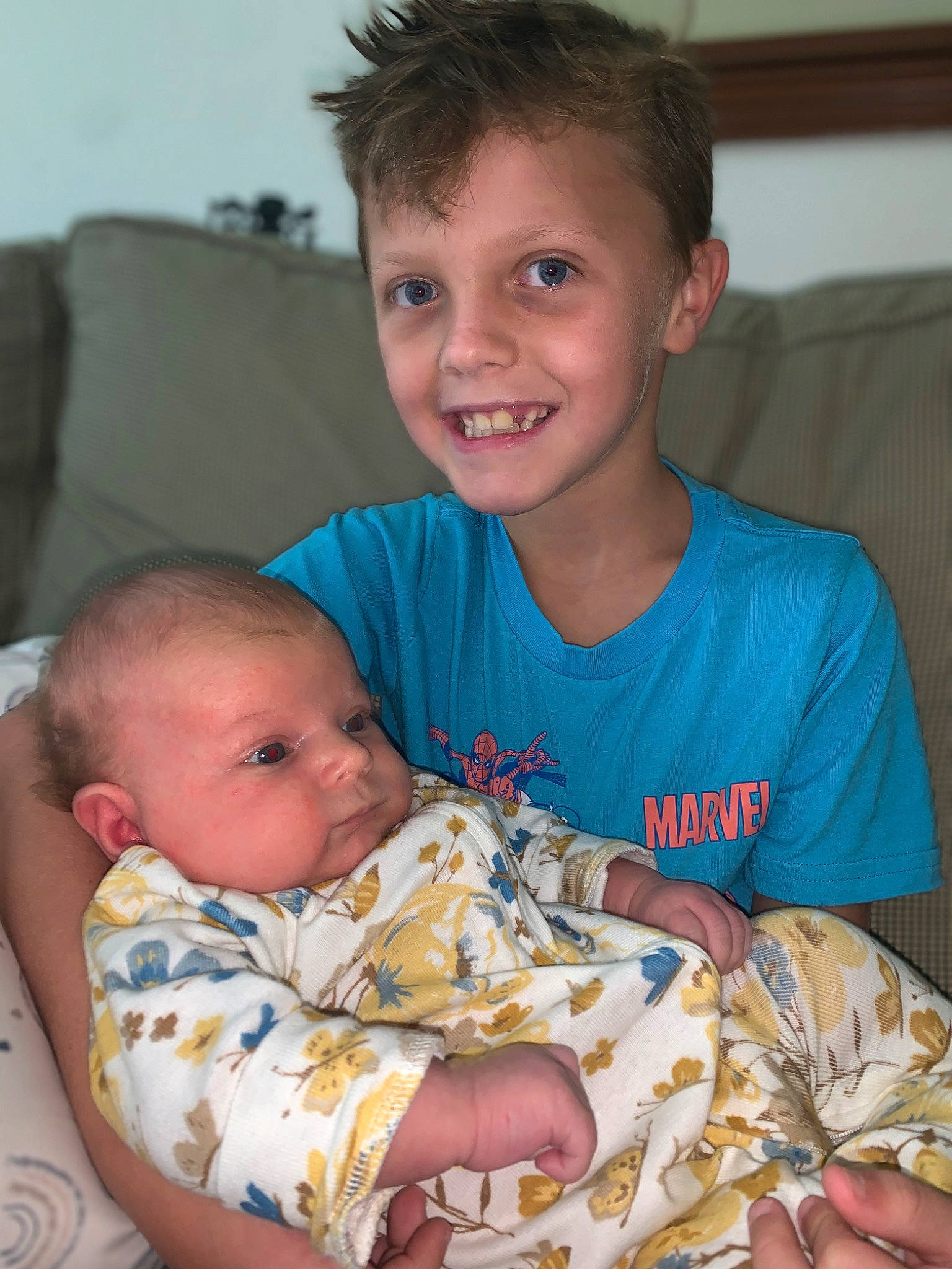 Kanen joined the competition — help win amazing prizes! baby, cheek, chin, comfort, couch, face, finger, hair, hand, happy, head, human_body, iris, joy, lap, mouth, muscle, person, skin, smile