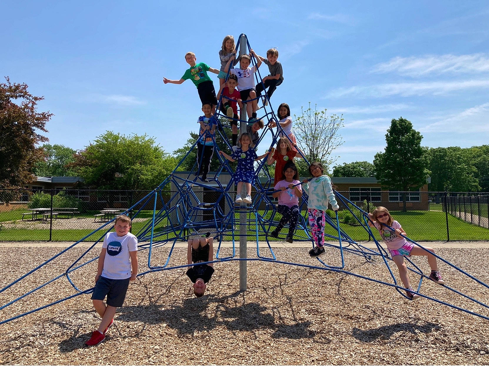 Alannah is registered to the contest to win money with this photo: balance, city, cloud, event, fun, grass, joy, leisure, outdoor_play_equipment, people_in_nature, person, plant, play, playground, pole, recreation, shorts, sky, soil, sports