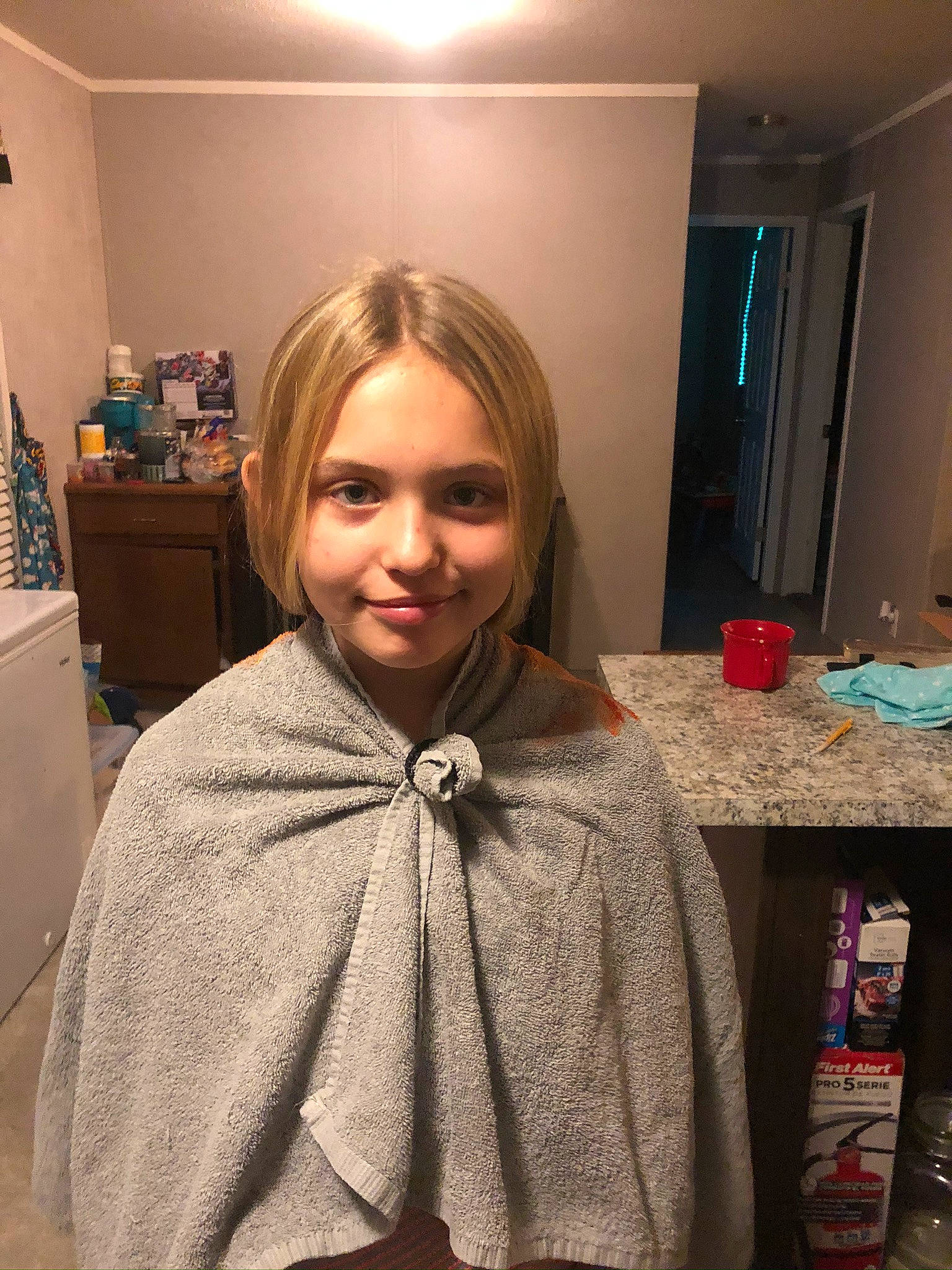 Lillian is registered to the contest to win money with this photo: cabinetry, chest_of_drawers, drawer, eye, hair_care, hair_coloring, hairdresser, joy, linens, makeover, mirror, person, personal_grooming, room, sweater