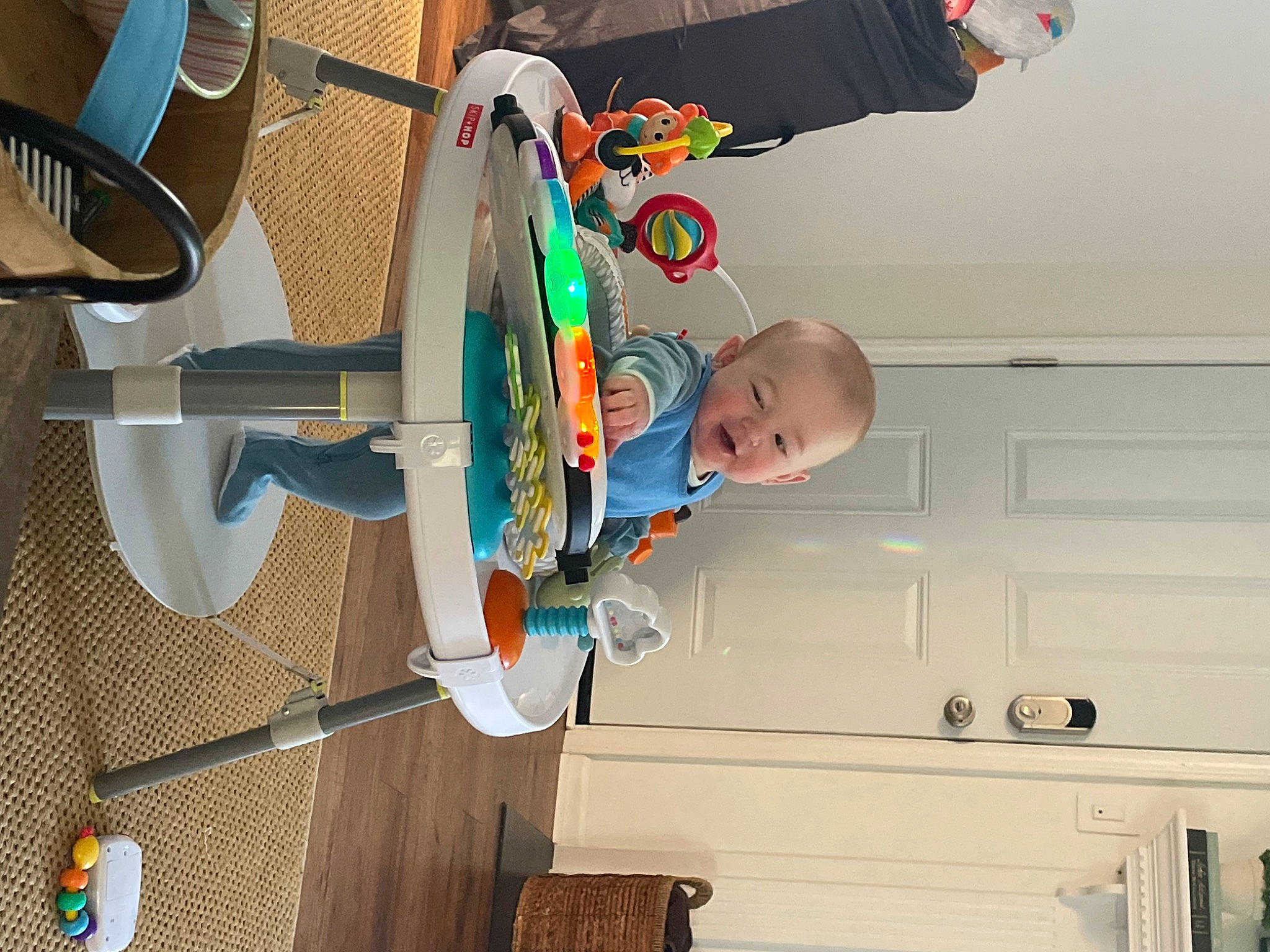 Luke is registered to the contest to win money with this photo: automotive_wheel_system, baby, cabinetry, chair, child, cupboard, door, drawer, fun, hardwood, hat, machine, person, room, toddler, wheel, wood