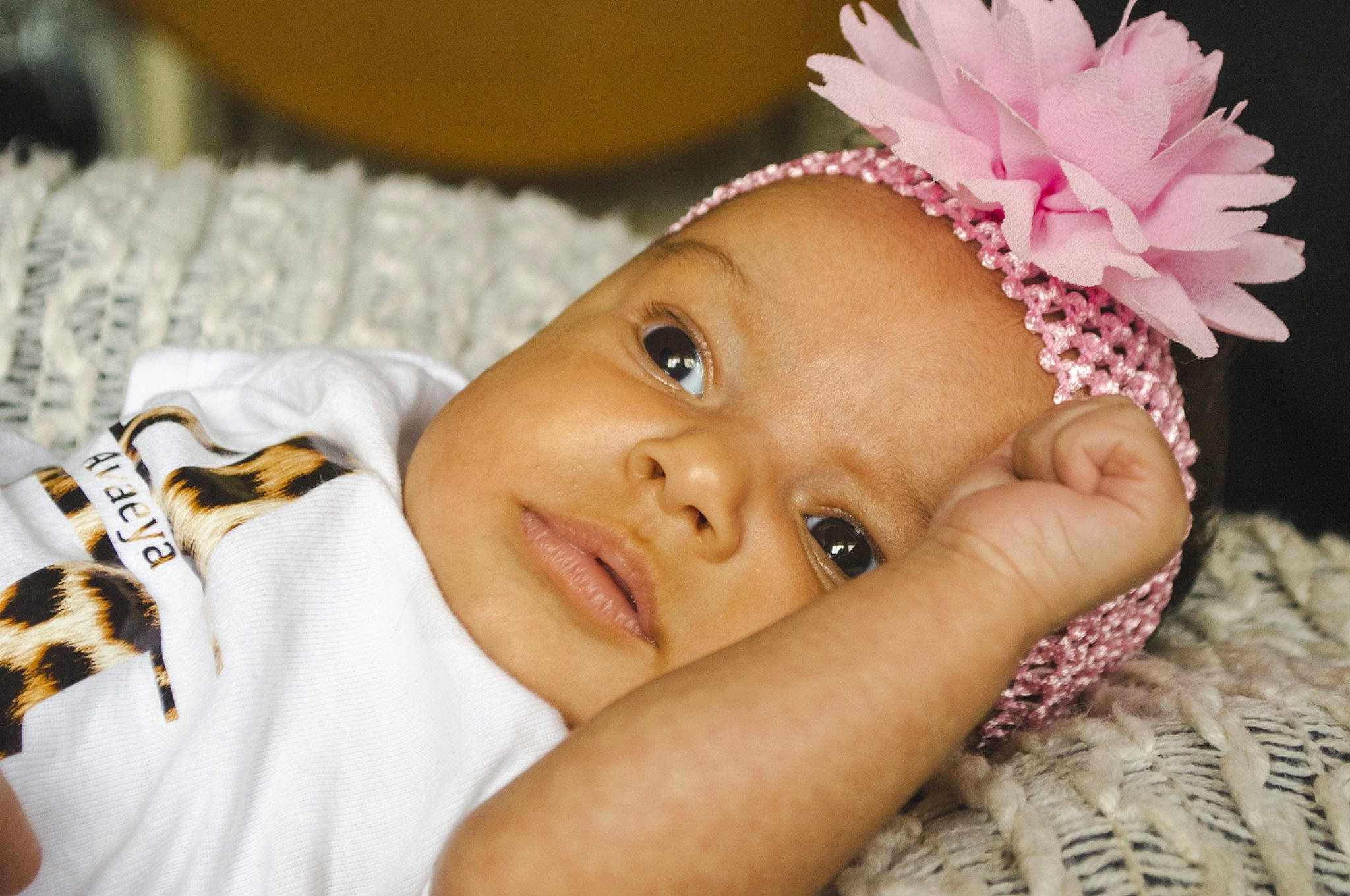 Avaeya joined the competition — help win amazing prizes! baby, baby_toddler_clothing, chin, eyebrow, eyelash, facial_expression, finger, flash_photography, flower, hairstyle, happy, headgear, headpiece, lip, nail, person, petal, skin, smile, textile