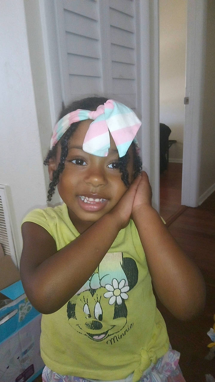 Ariel is registered to the contest to win money with this photo: arm, child, door, elbow, event, eyebrow, eyewear, fashion_accessory, fun, goggles, happy, headgear, headpiece, headwear, joy, magenta, person, personal_protective_equipment, room, sleeve