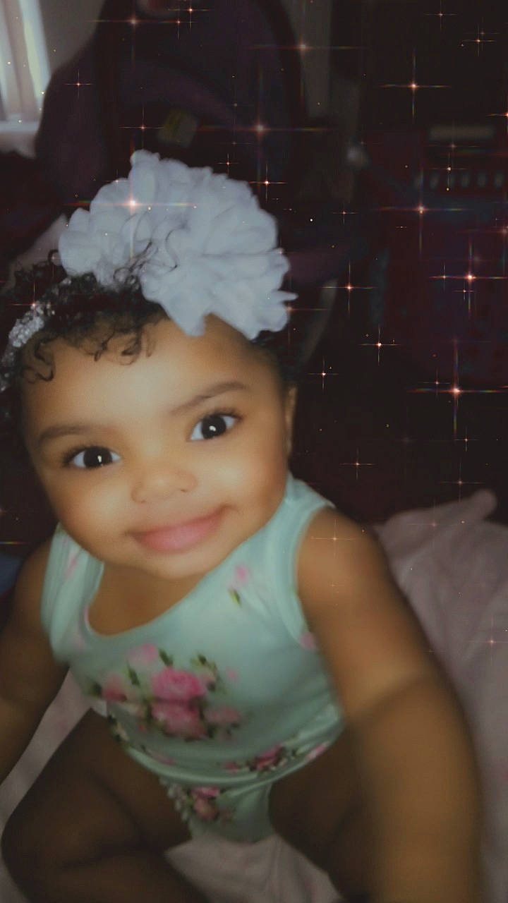 Noa is registered to the contest to win money with this photo: baby, baby_toddler_clothing, cheek, child, chin, costume_hat, eyebrow, eyelash, fashion_accessory, flash_photography, happy, hat, headband, headgear, headpiece, iris, joy, lip, person, pink