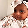 Nila participe au concours pour gagner de l'argent avec cette photo : baby, child, face, headband, drool, floral_pattern, clothing, cute, portrait, infant, indoors, skin, eyelashes, expression, young_child, person, closeup, headwear, adorable, smile