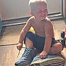 Dane joined the competition — help win amazing prizes! child, toddler, boy, indoor, smiling, bare_chested, sneakers, playing, floor, toy_car, light, happy, pants, casual, young_child, cute, fun, home, carpet, footwear