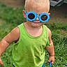 Dane joined the competition — help win amazing prizes! child, boy, sunglasses, blue_sunglasses, green_tank_top, dirty_clothes, outdoor, grass, toy, smile, blond_hair, short_hair, summer, playful, confident, portrait, person, casual_clothing, dirt, daylight