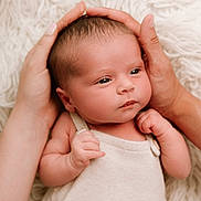 Florence is registered to the contest to win money with this photo: baby, child, closeup, cute, face, gentle, hands, human, infant, natural_light, newborn, peaceful, person, portrait, resting, skin, sleepy, small_hands, soft_texture, white_blanket