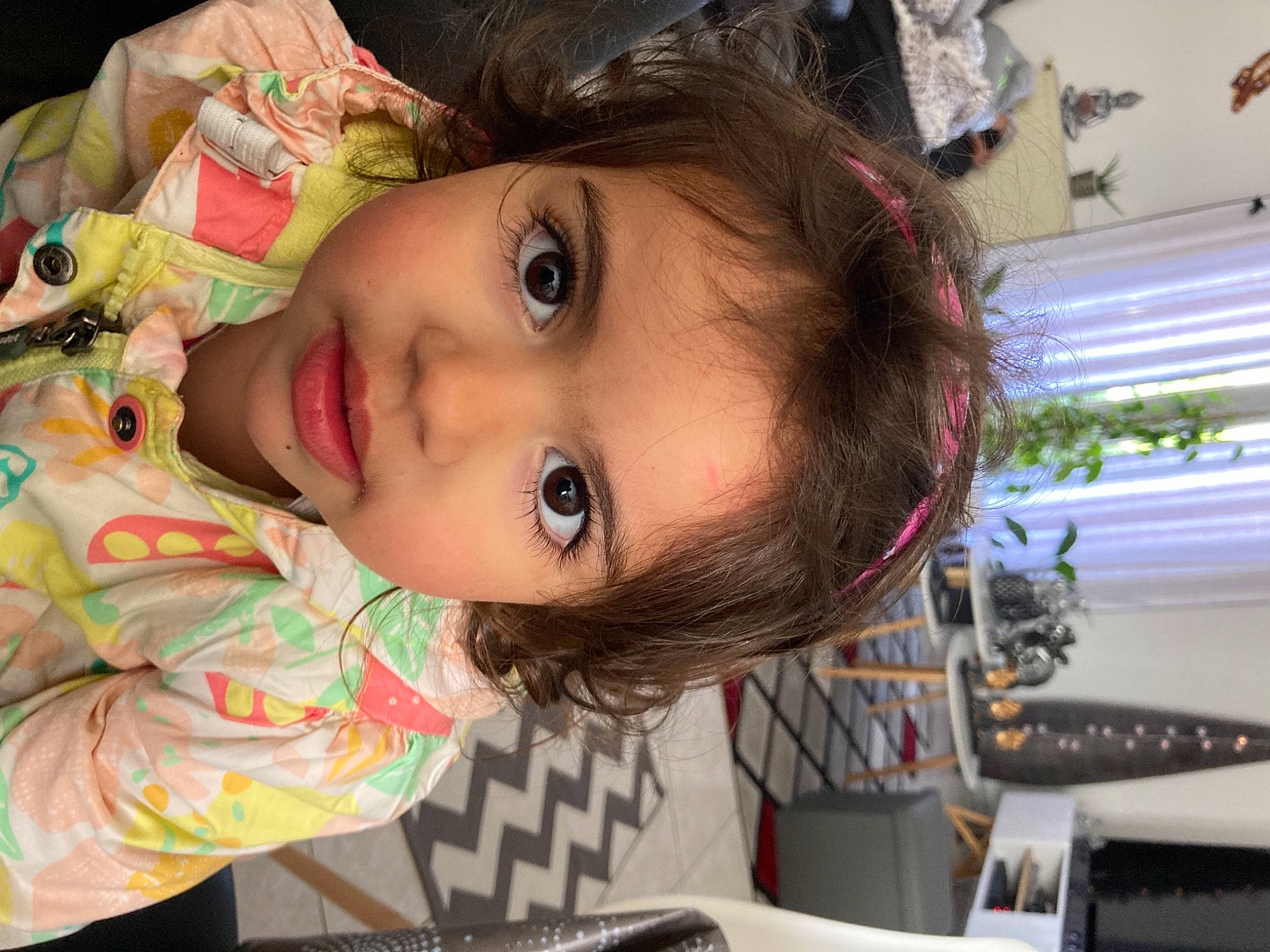 Carolina participe au concours pour gagner de l'argent avec cette photo : black_hair, cheek, child, chin, dress, eye, eyebrow, eyelash, forehead, fun, happy, iris, lip, mouth, neck, nose, organ, person, plant, skin