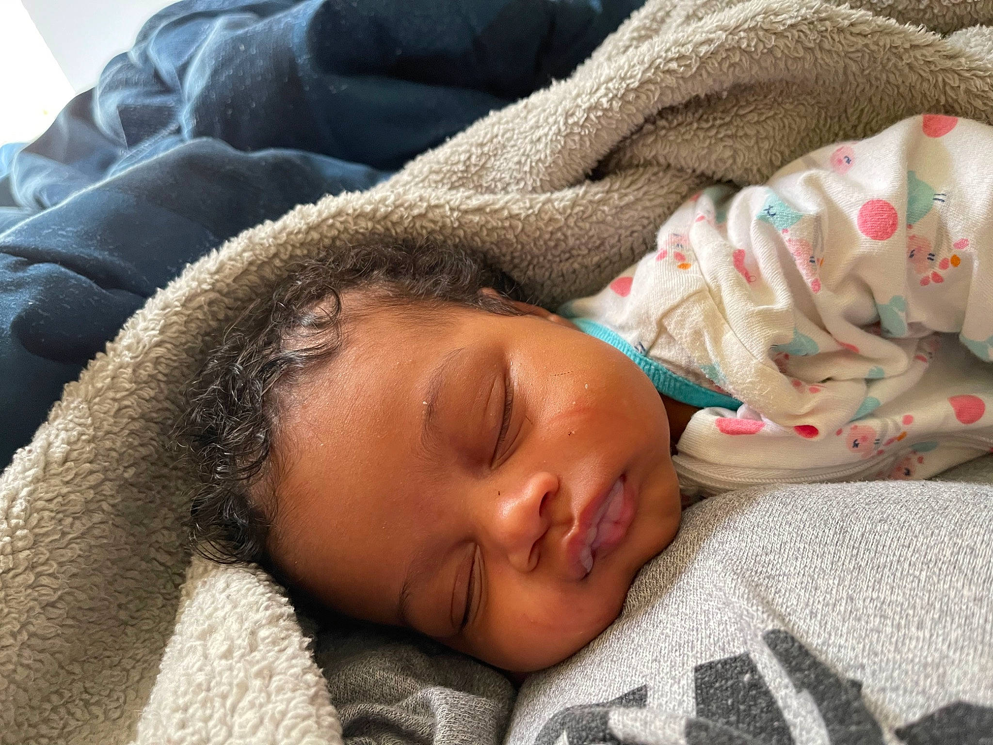 Sapphire is registered to the contest to win money with this photo: baby, baby_sleeping, bedding, bedtime, cheek, child, comfort, couch, eyelash, fur, hair, linens, lip, mammal, nap, nose, person, room, skin, textile