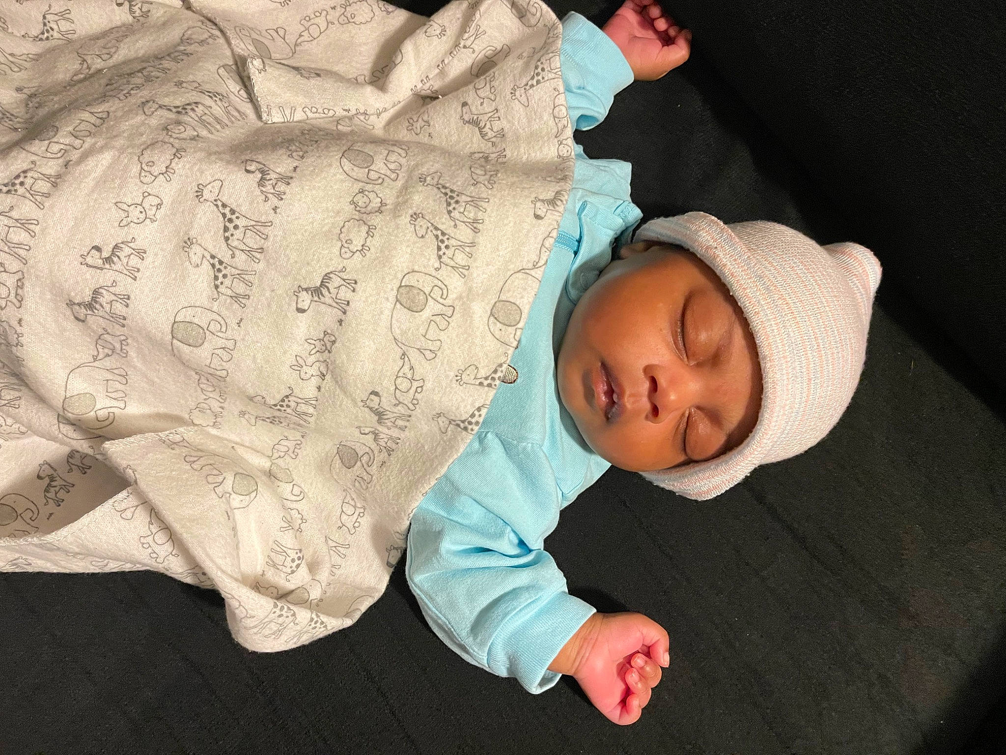 Sapphire is registered to the contest to win money with this photo: baby, baby_products, baby_sleeping, baby_toddler_clothing, bedtime, cheek, child, comfort, headgear, headwear, human_body, linens, nose, person, product, sitting, skin, sleeve, textile, toddler