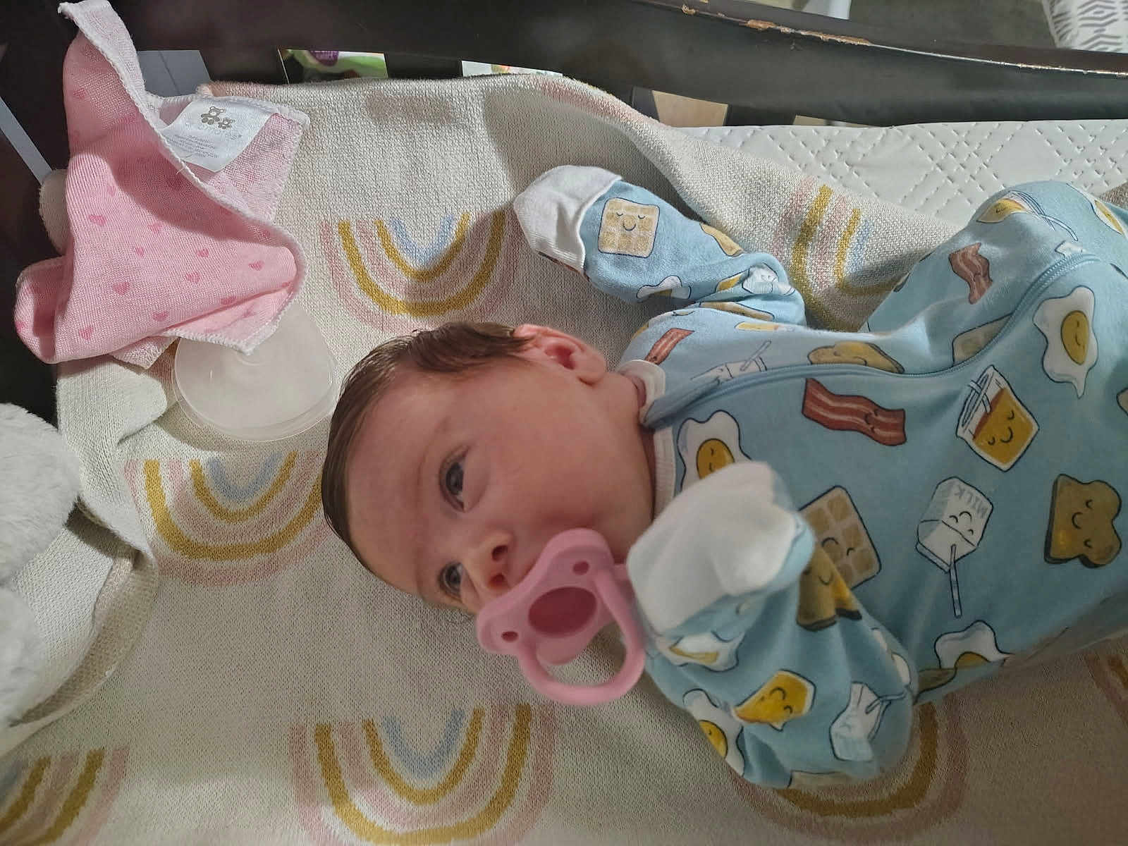 Anora joined the competition — help win amazing prizes! baby, pacifier, blanket, onesie, infant, sleepwear, cute, pastel_colors, patterned_clothing, lying_down, newborn, soft_texture, indoor, child, smiling_faces, fabric, comfort, resting, toddler, quiet