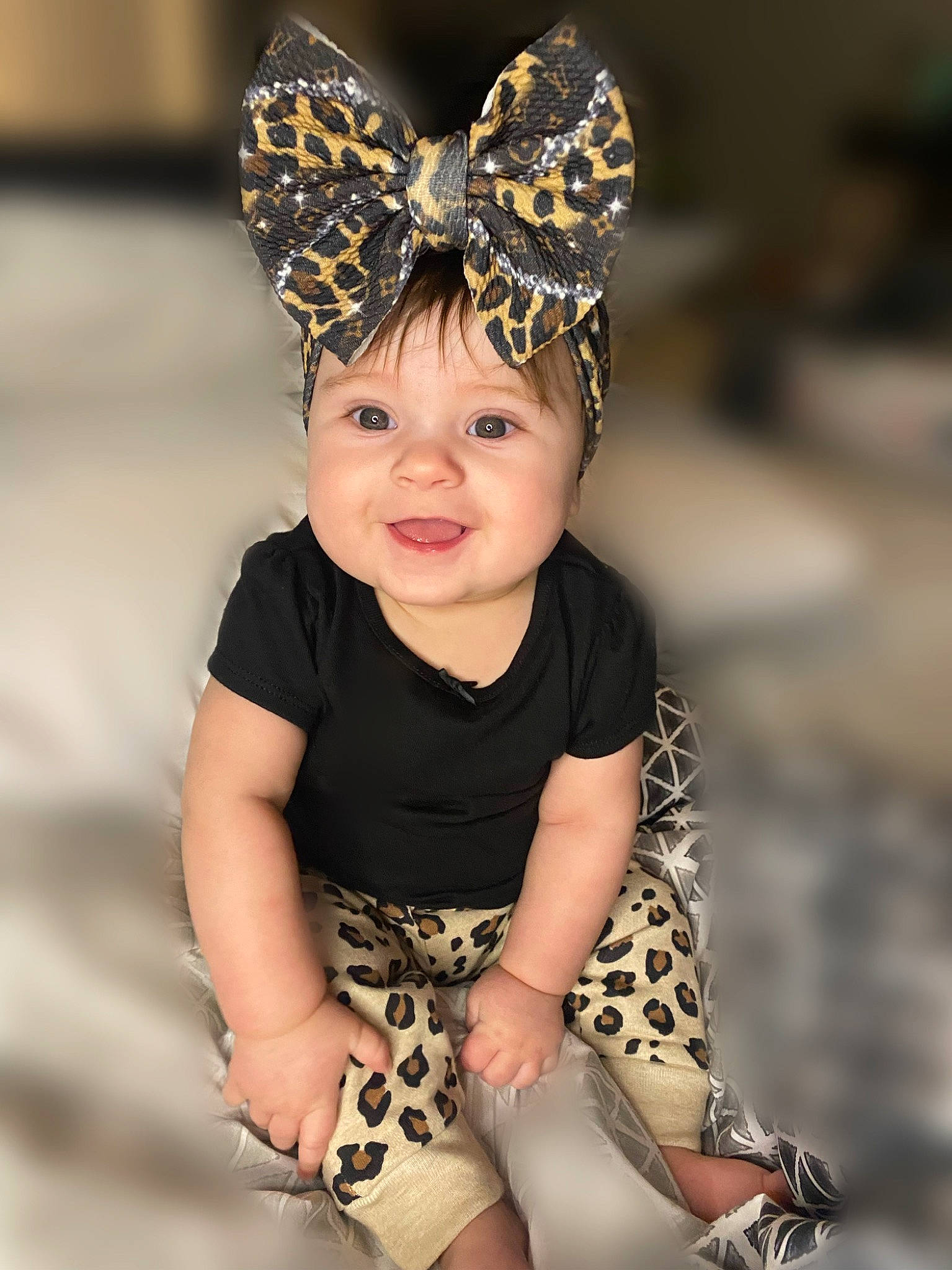 Amilia is registered to the contest to win money with this photo: arthropod, baby, baby_toddler_clothing, butterfly, eye, flash_photography, happy, head, headpiece, headwear, insect, iris, jewellery, joy, pattern, person, photograph, pink, pollinator, sleeve