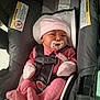 Rosèminá is registered to the contest to win money with this photo: baby, car_seat, pacifier, pink_clothing, mittens, hat, infant, child, straps, safety_harness, cute, indoor, newborn, person, seat, adorable, young_child, closeup, portrait, infant_clothing