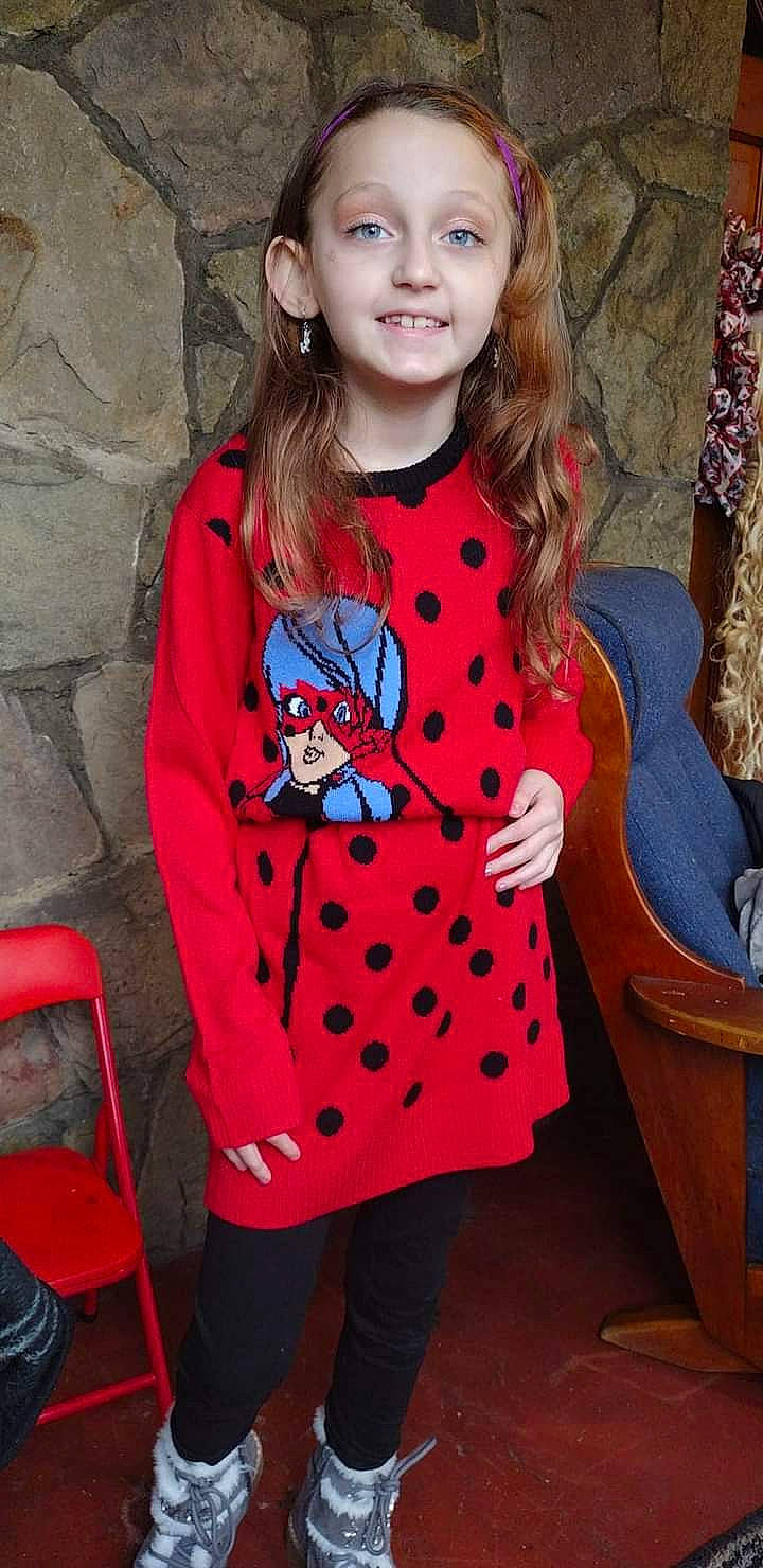 Dolores joined the competition — help win amazing prizes! baby_toddler_clothing, brown_hair, clothing, curtain, denim, dress, electric_blue, fashion, fashion_accessory, insect, joy, magenta, neck, outerwear, pattern, person, pink, sleeve, smile, t_shirt