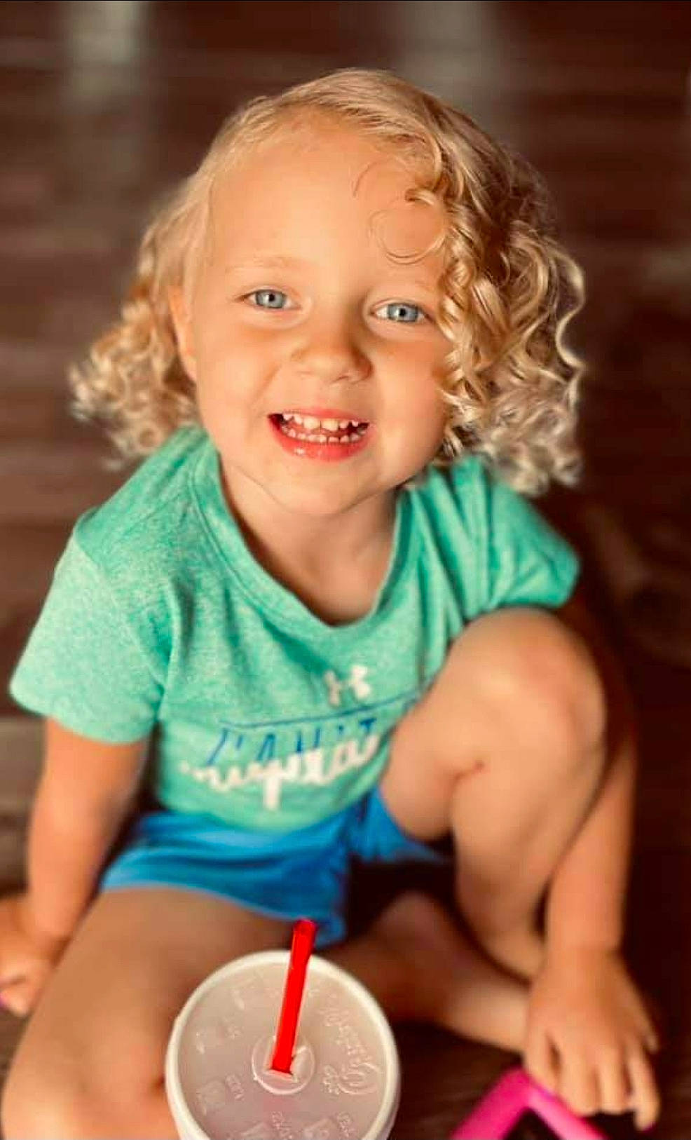 Tynsleigh is registered to the contest to win money with this photo: baby, baby_toddler_clothing, cheek, dress, eye, finger, flash_photography, hair, hairstyle, hand, happy, human_body, iris, joy, lip, mouth, nose, organ, person, product