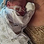 newborn, baby, infant, blanket, elephant_pattern, medical_tube, bear_sticker, sleeping, arm, holding, person, skin, clothing, closeup, resting, cute, hospital, care, comfort, toddler