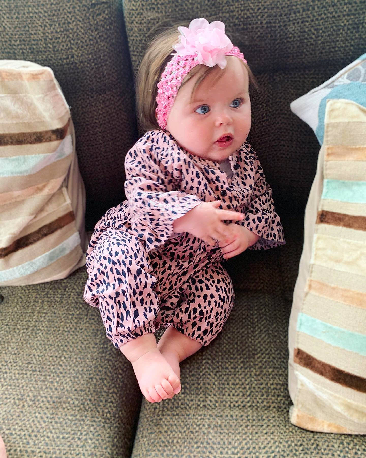 Harlie joined the competition — help win amazing prizes! baby, baby_products, baby_toddler_clothing, child, design, dress, hair_accessory, headgear, pattern, person, pink, product, sitting, toddler