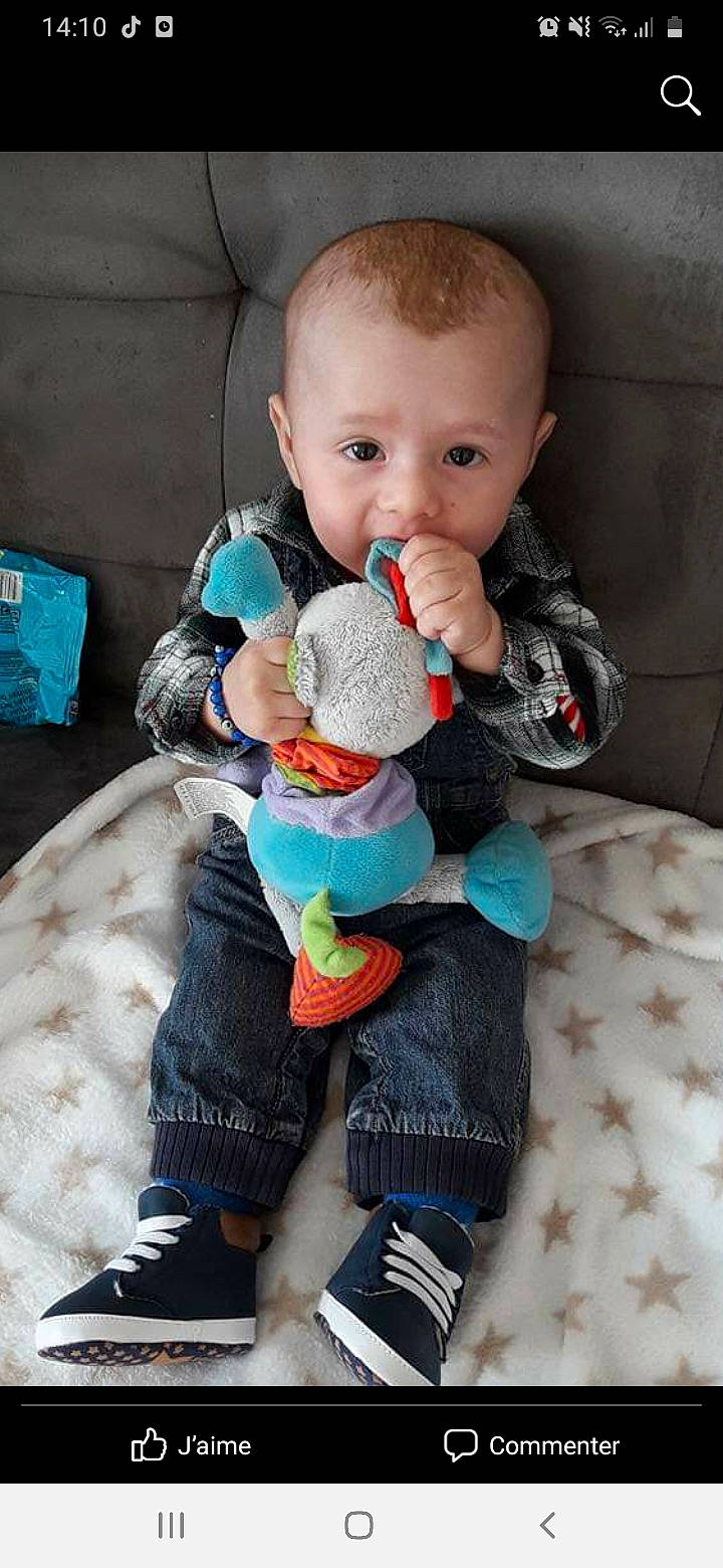 Ilyan participe au concours pour gagner de l'argent avec cette photo : baby, baby_products, baby_sleeping, baby_toddler_clothing, blue, cheek, child, comfort, doll, linens, person, plush, sitting, skin, sock, stuffed_toy, teddy_bear, textile, toddler, toy