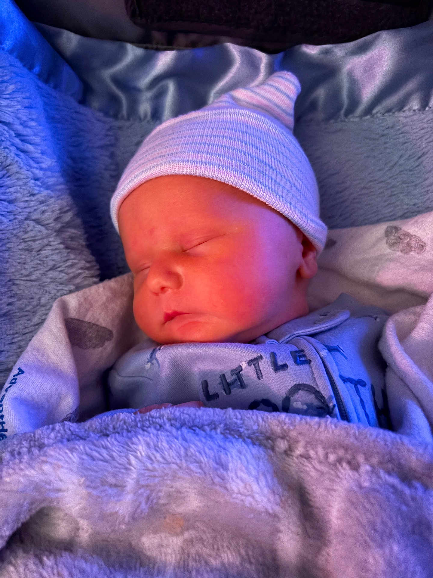 Colson joined the competition — help win amazing prizes! baby, newborn, sleeping, infant, hat, knit_hat, blanket, swaddle, onesie, cozy, cheeks, peaceful, portrait, close_up, bedding, nursery, soft_texture, sleepwear, hand, face