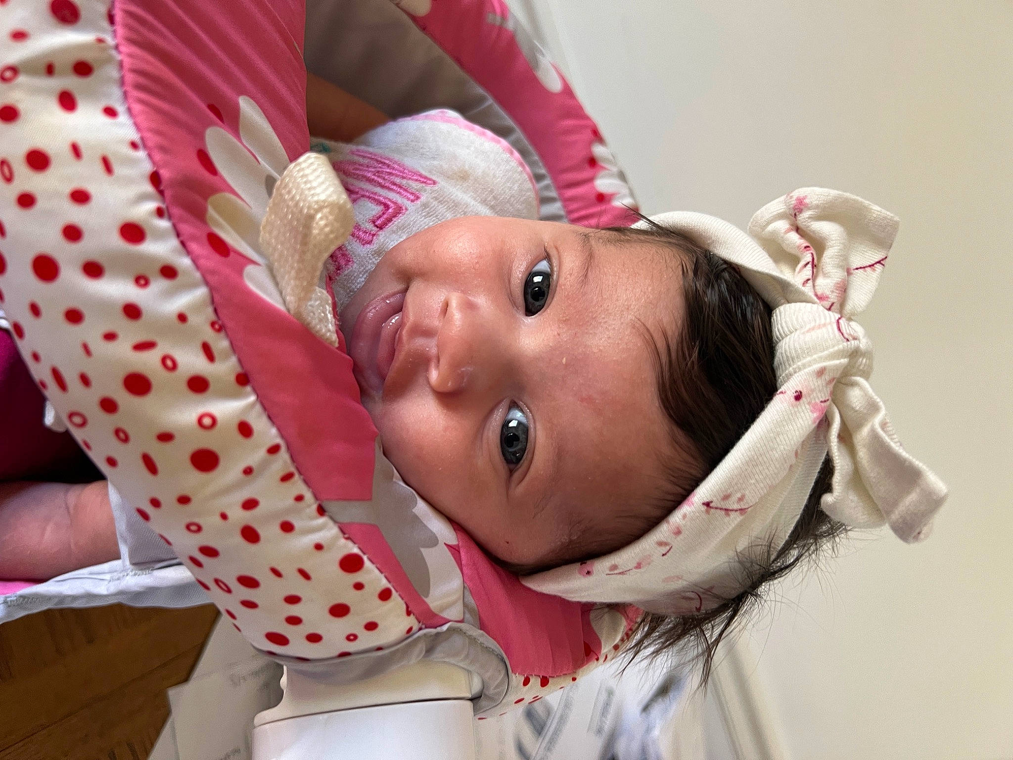 Maria Byas is registered to the contest to win money with this photo: baby, baby_products, baby_toddler_clothing, cheek, child, ear, eye, eyebrow, eyelash, fashion_accessory, hair_accessory, happy, headgear, headpiece, lip, neck, person, pink, skin, textile