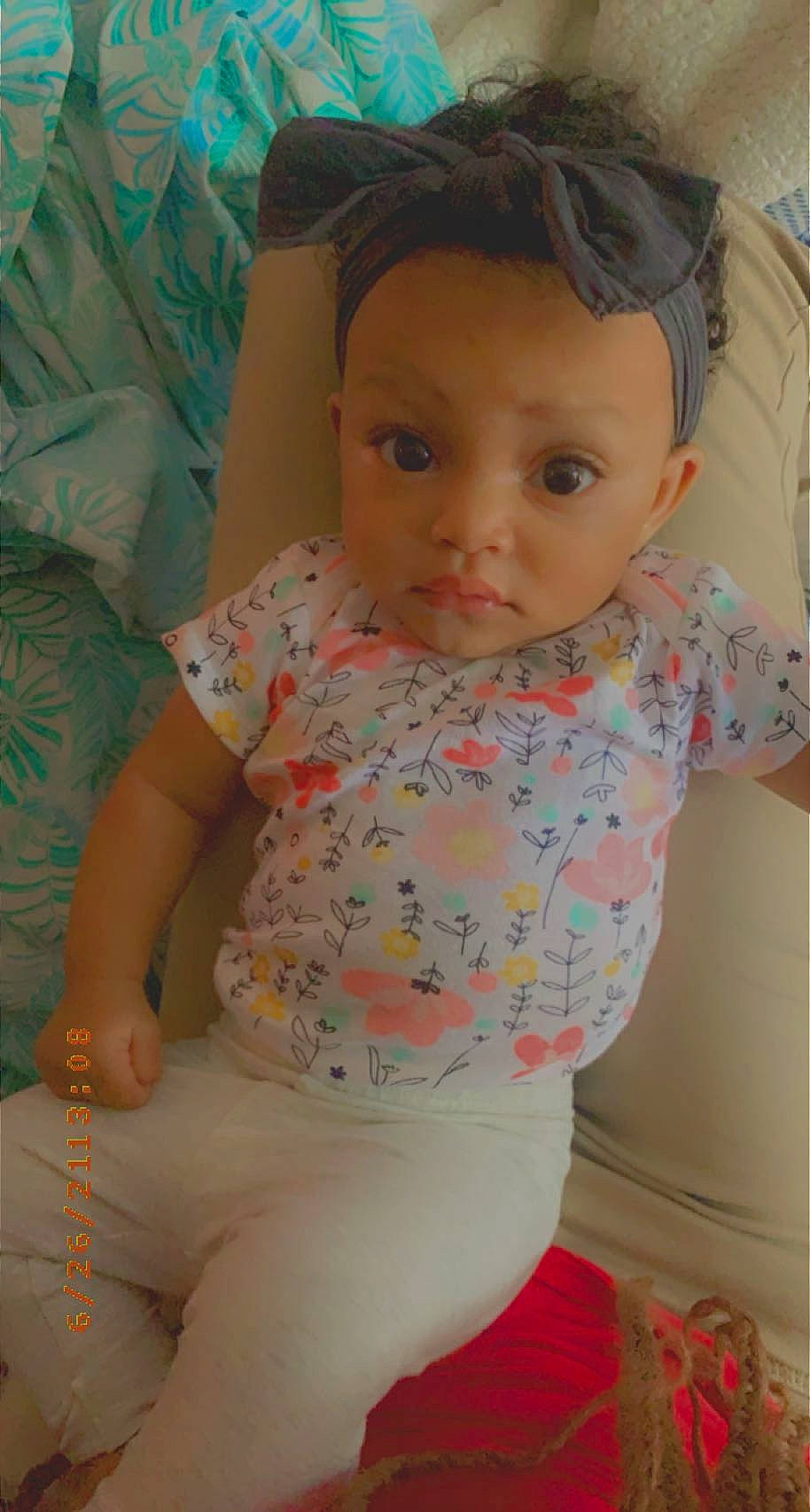 Kamiyah is registered to the contest to win money with this photo: baby, baby_toddler_clothing, cheek, comfort, eye, face, finger, head, human_body, iris, leg, lip, mouth, neck, nose, person, skin, sleeve, smile, stomach