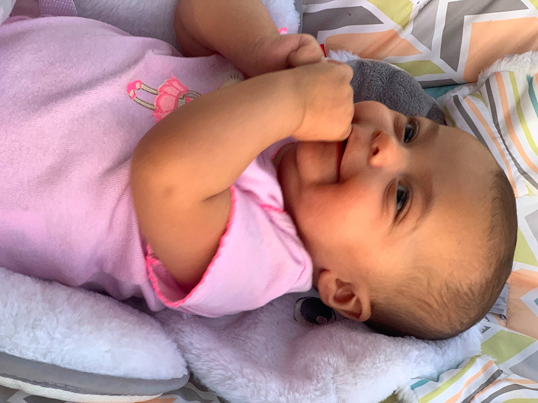 Delilah is registered to the contest to win money with this photo: baby, baby_products, baby_toddler_clothing, cheek, child, comfort, eyelash, finger, grass, happy, head, lip, mouth, nap, nose, person, skin, sleep, smile, toddler