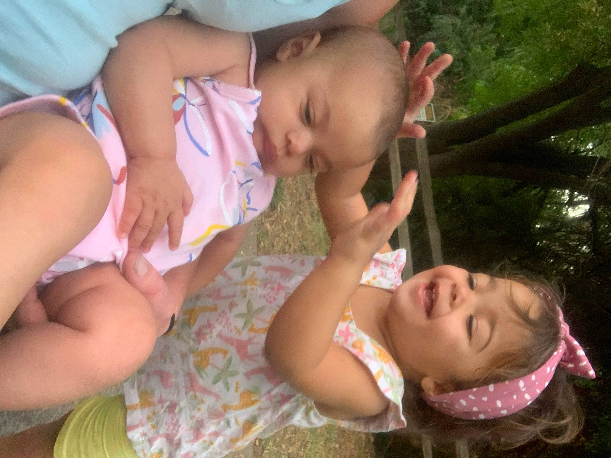 Estelle joined the competition — help win amazing prizes! abdomen, baby, baby_toddler_clothing, child, fun, grass, happy, leisure, nail, pattern, people_in_nature, person, pink, plant, sitting, skin, smile, summer, toddler, tree