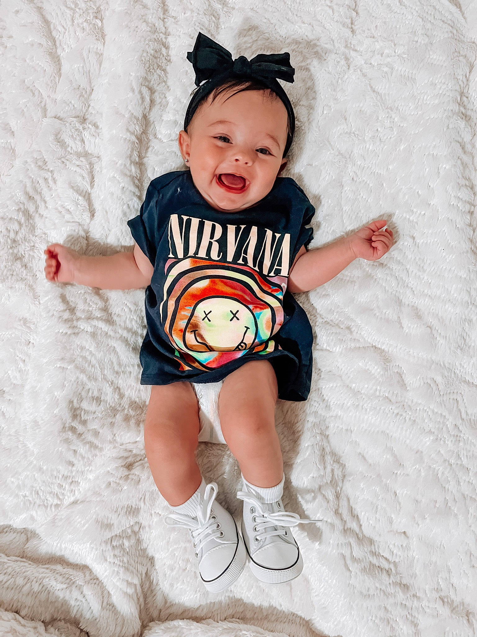 Blakely joined the competition — help win amazing prizes! baby_toddler_clothing, child, costume_accessory, costume_hat, eye, fashion_design, fun, happy, head, human_leg, knee, pattern, person, sitting, sleeve, smile, sportswear, t_shirt, thigh, toddler