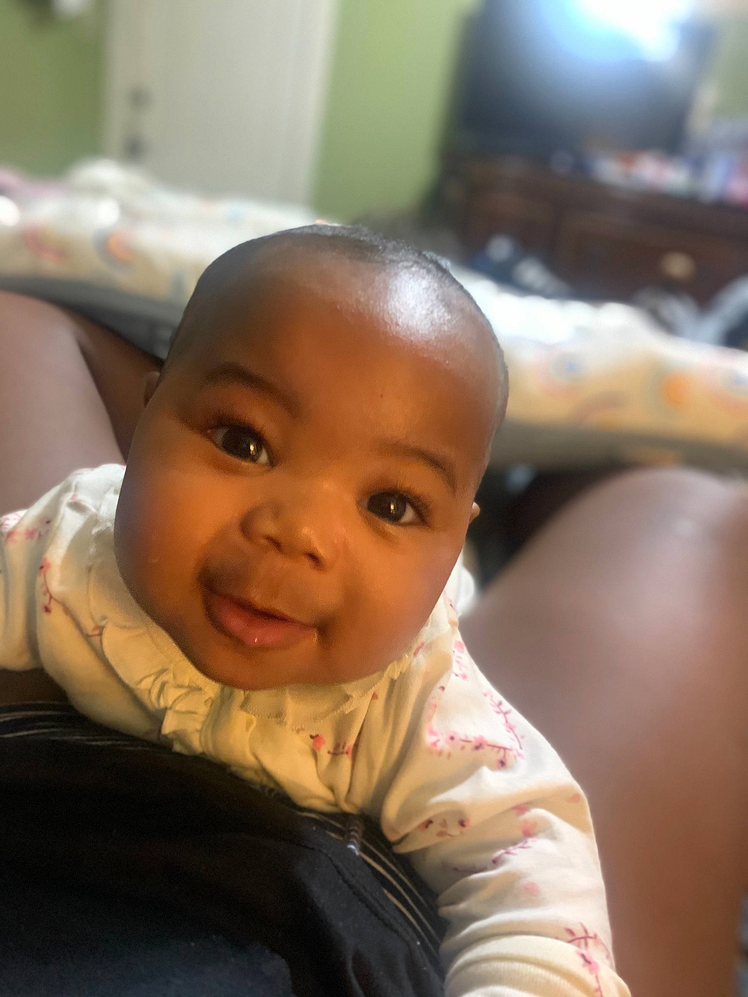 Kadence joined the competition — help win amazing prizes! baby, baby_toddler_clothing, black_hair, cheek, child, comfort, ear, eyebrow, flooring, fun, happy, iris, mammal, mouth, nose, person, room, sitting, skin, smile