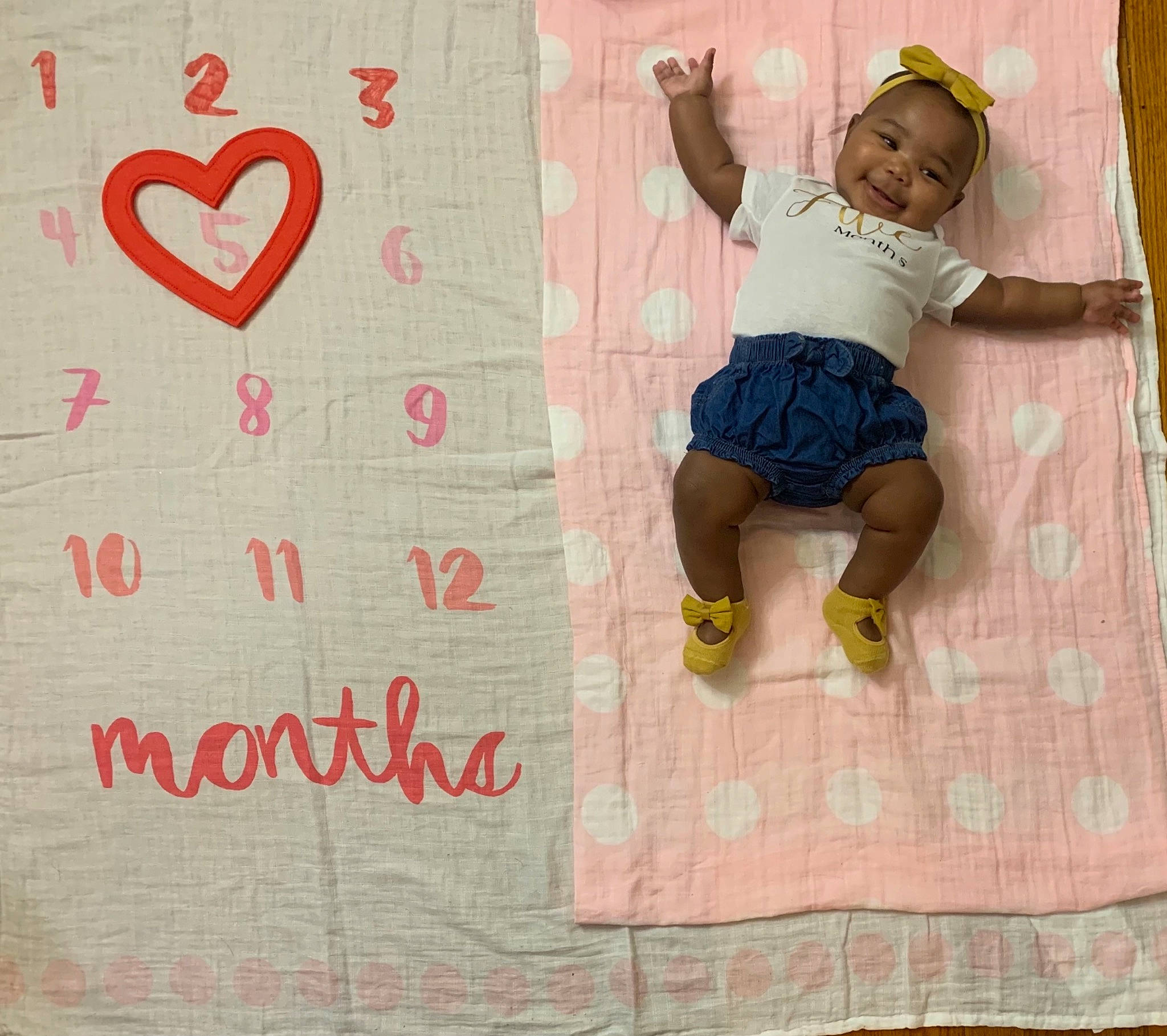 Kadence is registered to the contest to win money with this photo: baby, baby_toddler_clothing, child, design, event, facial_expression, font, handwriting, happy, joy, linens, magenta, pattern, person, pink, product, shorts, smile, sock, t_shirt